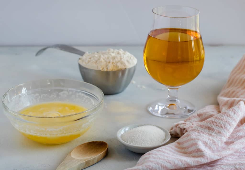 4 ingredients for beer bread- beer, self rising flour, sugar, and butter
