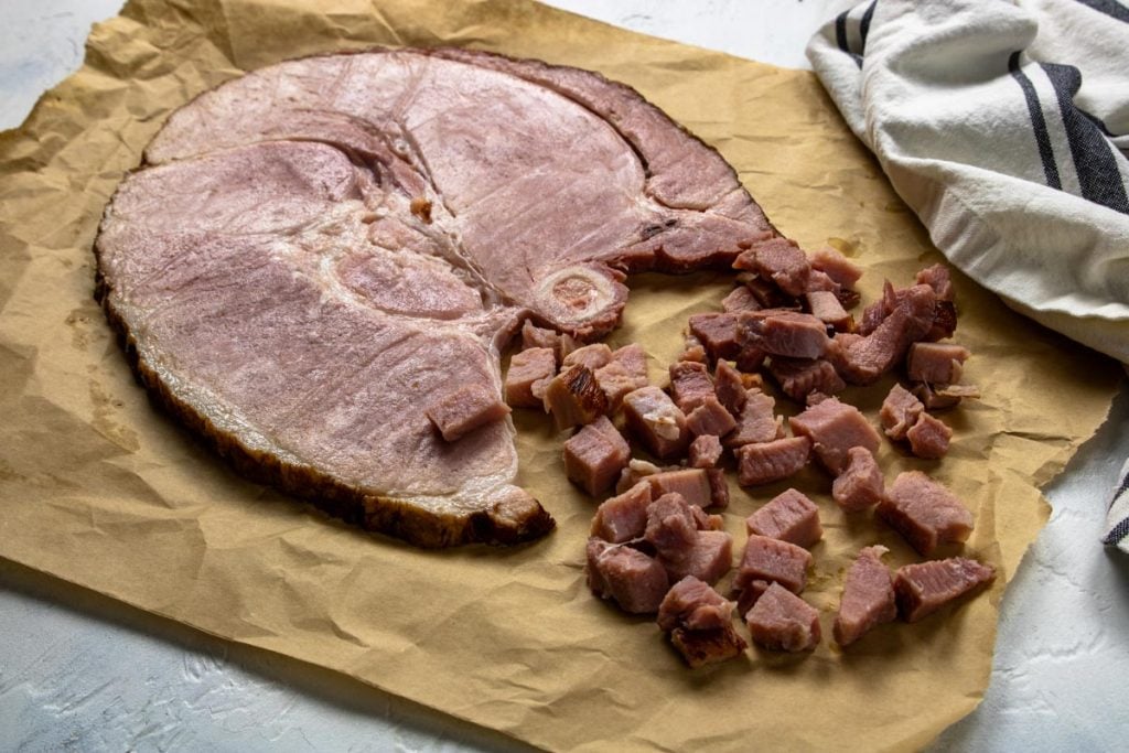 Bone in ham steak with some pieces cut