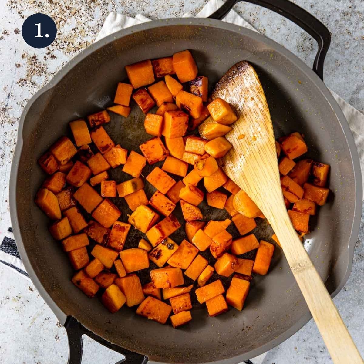 cubed sweet potatoes in a skillet