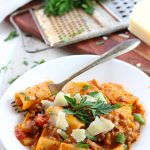 rigatoni in a bowl with sausage and sauce