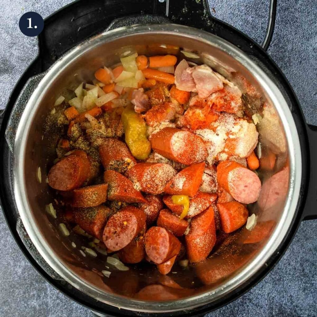 instant pot with sausage, chicken, onions and seasonings