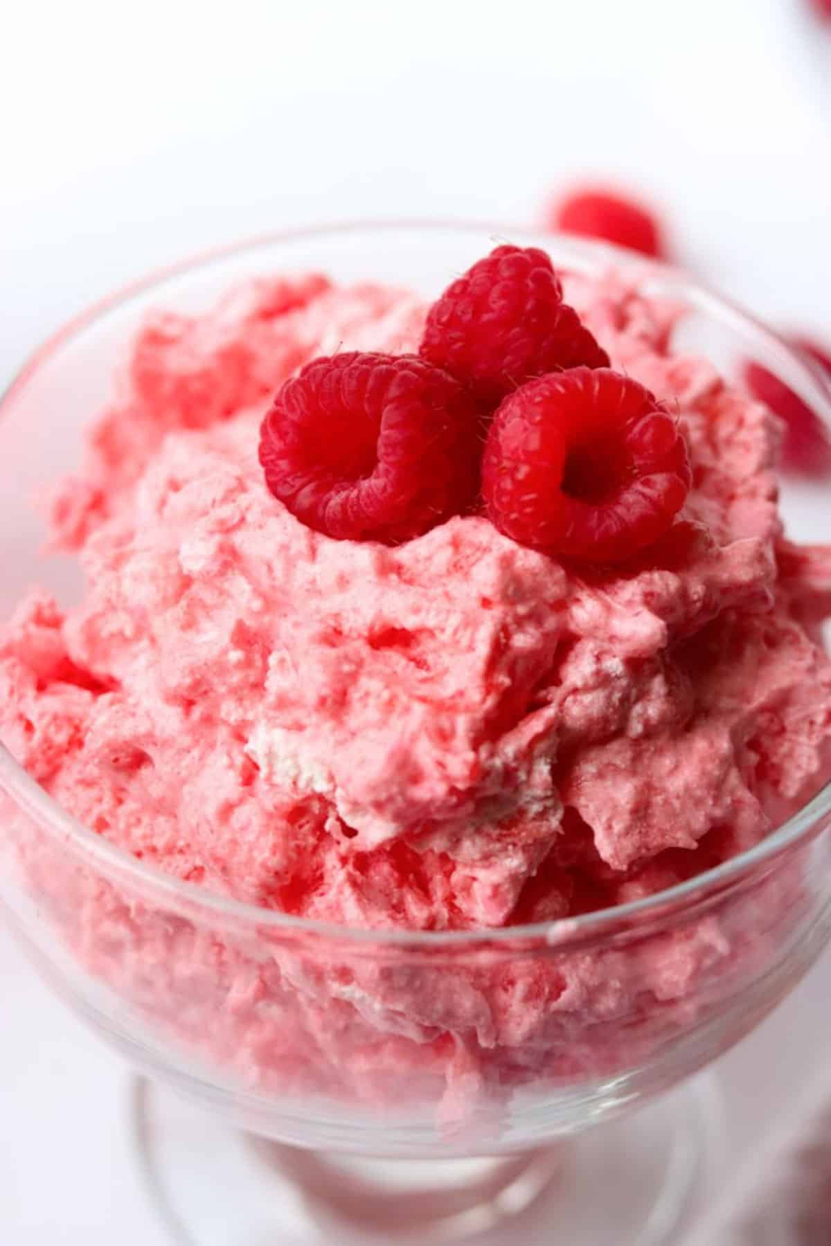 a close up of raspberry jello fluff