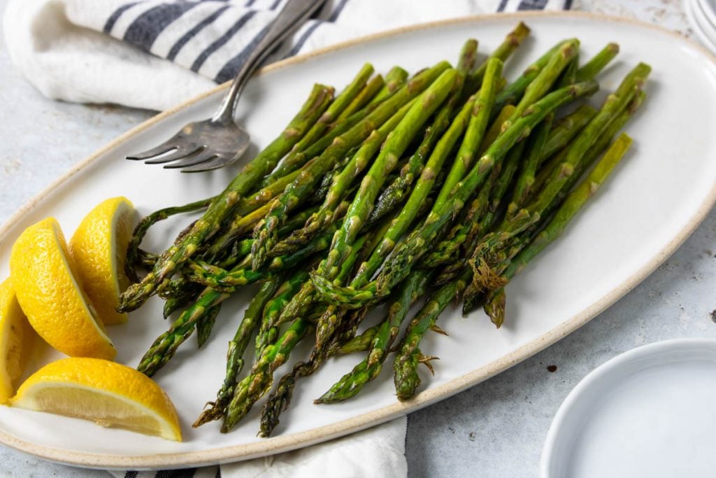 fresh cooked asparagus on a plate