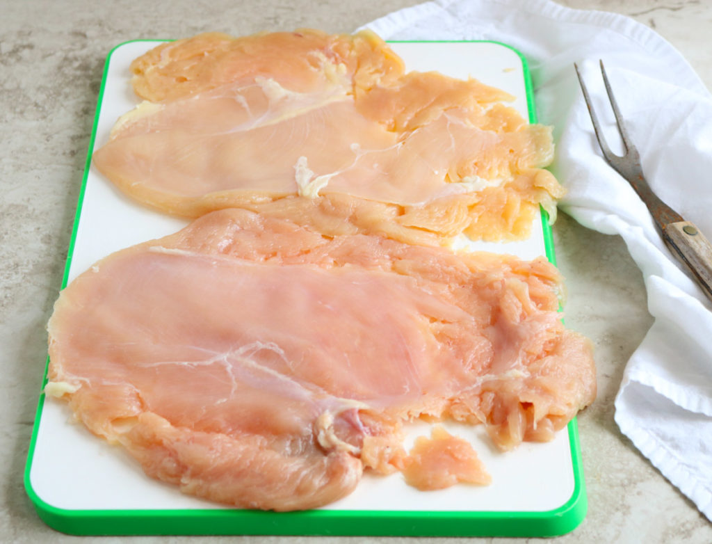 raw chicken pounded thin