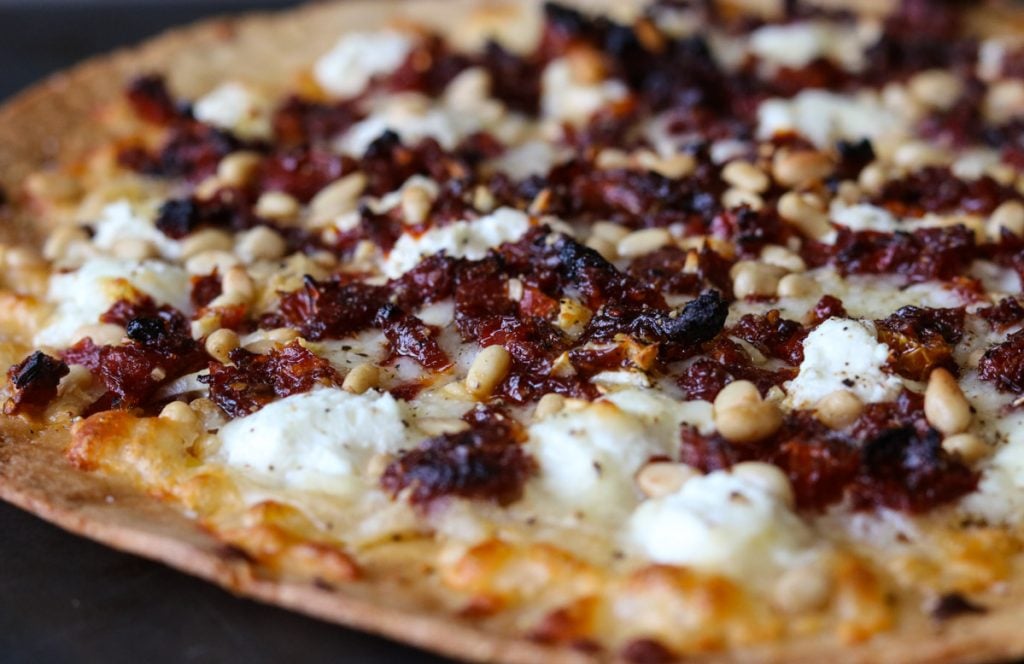 Goat Cheese Pizza with Sun Dried Tomatoes and Pine Nuts 