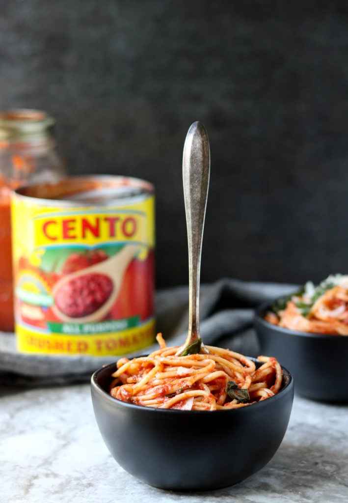 spaghetti in a bowl with a fork standing up