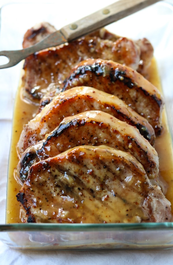 grilled pork chops topped with apple dijon glaze