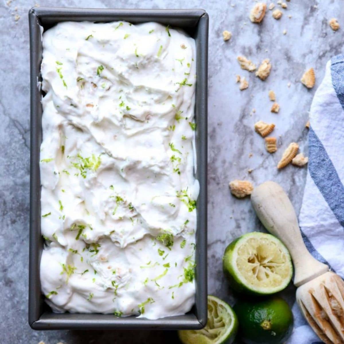 a loaf pan filled with key lime ice cream