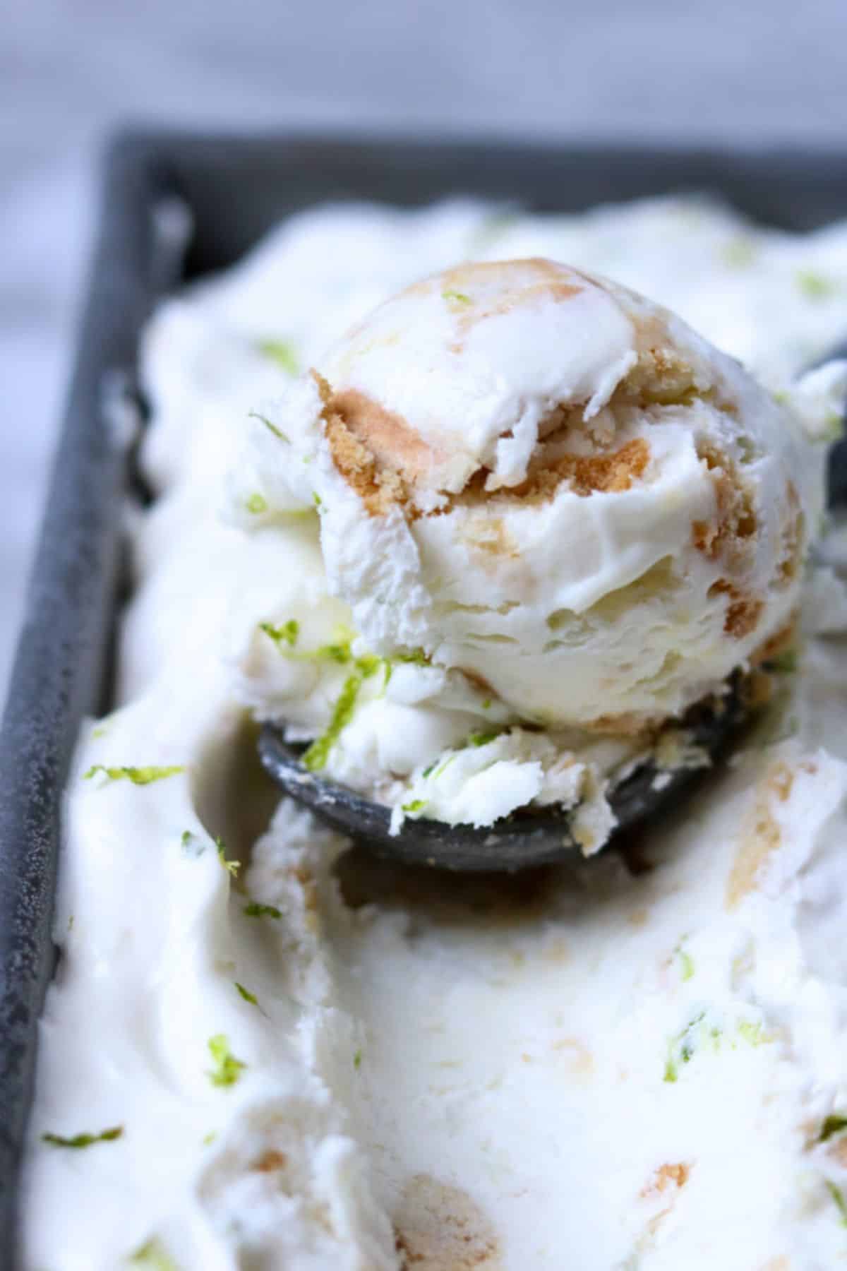 key lime ice cream with vanilla oreos being scooped