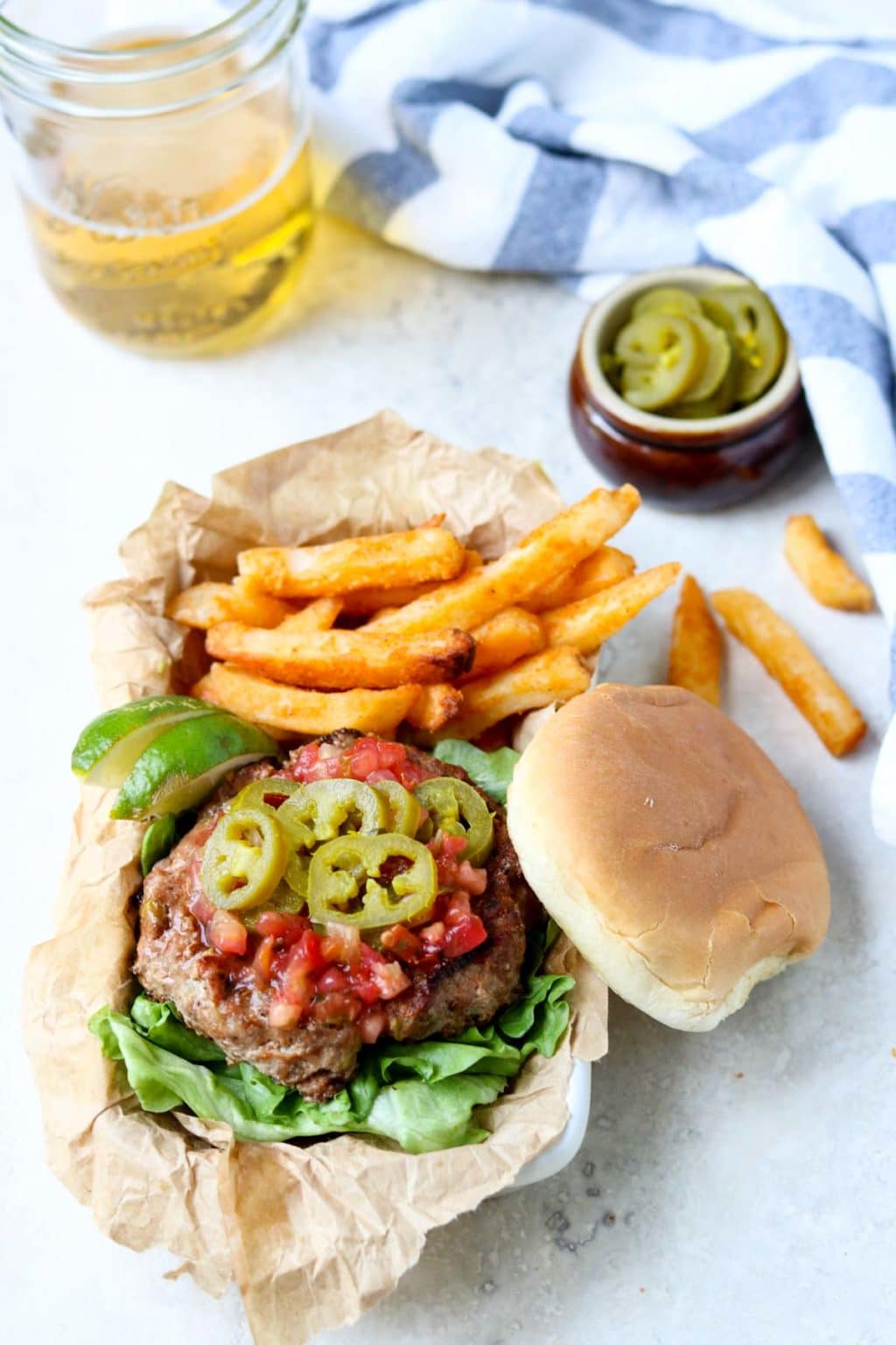 a turkey burger with jalapenos and salsa 