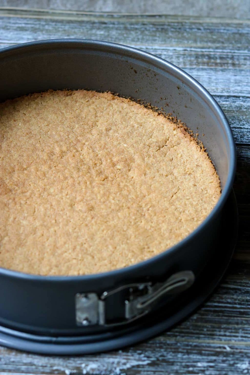 Vanilla Wafer crust baked into a spring form pan