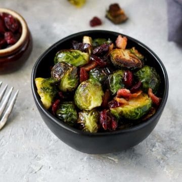 roasted brussels sprouts in a black bowl