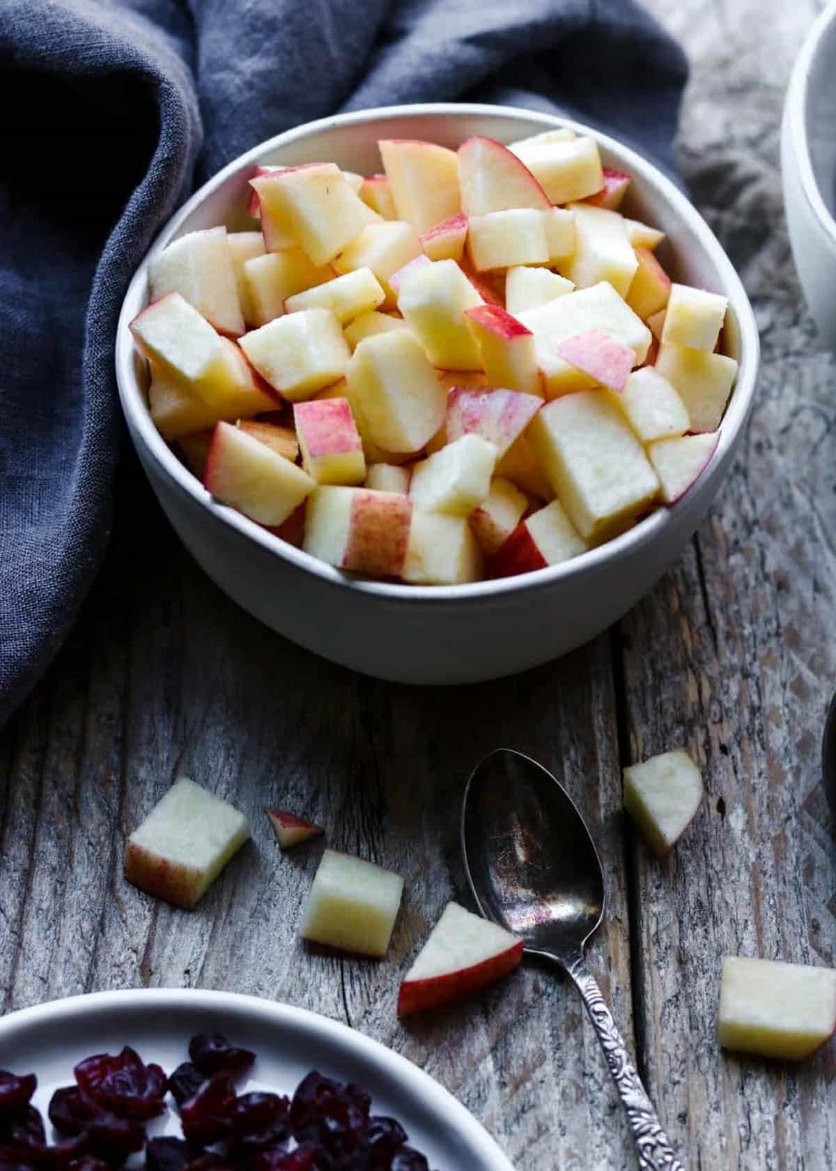 apples and raisins in a bowl