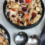 Oatmeal in a bowl with fruit and nuts