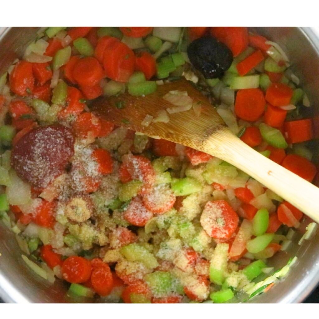 Tomato Paste, and seasonings added to a mirepiox in the Instant Pot