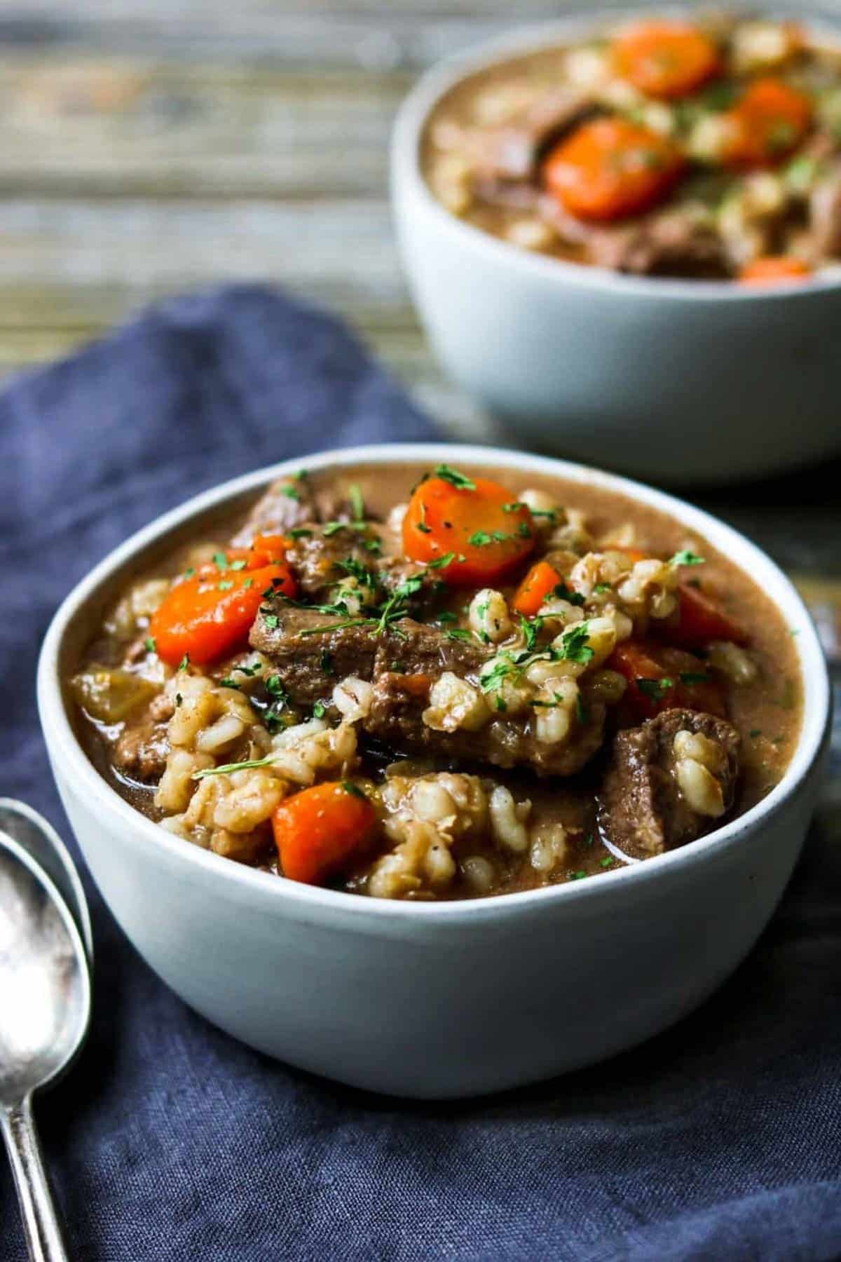 two bowls of beef and barley soup