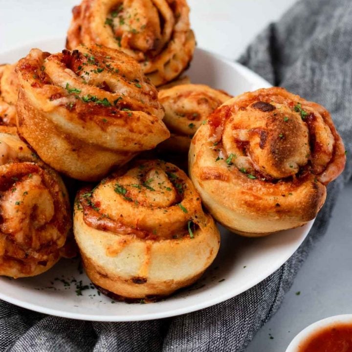 Pizza Roll Ups in a white bowl