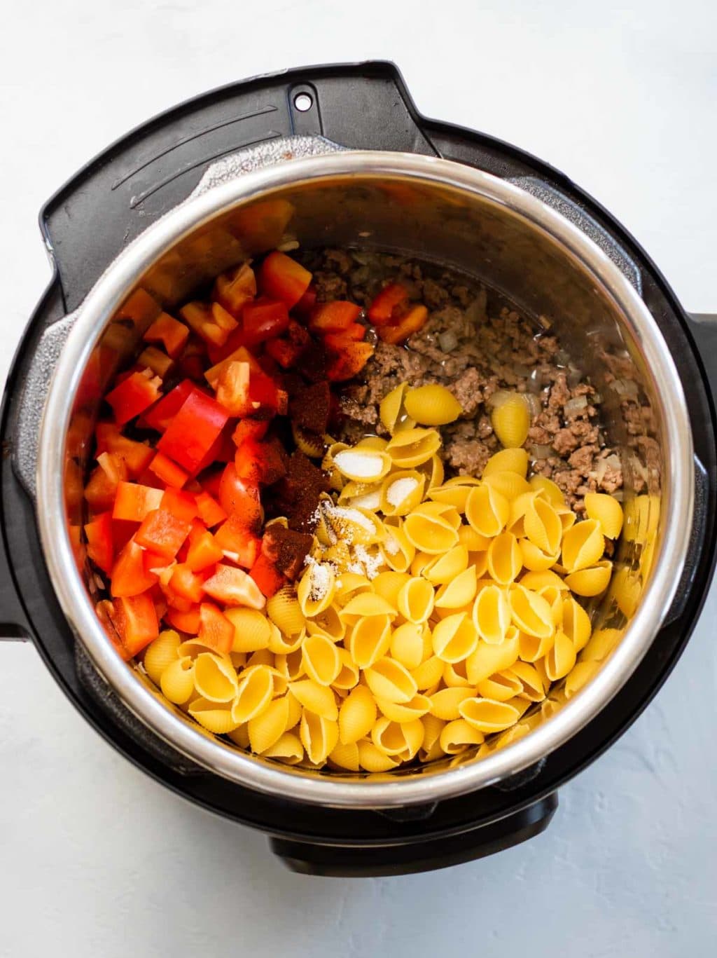 Instant Pot pasta recipe with ingredients in the instant pot