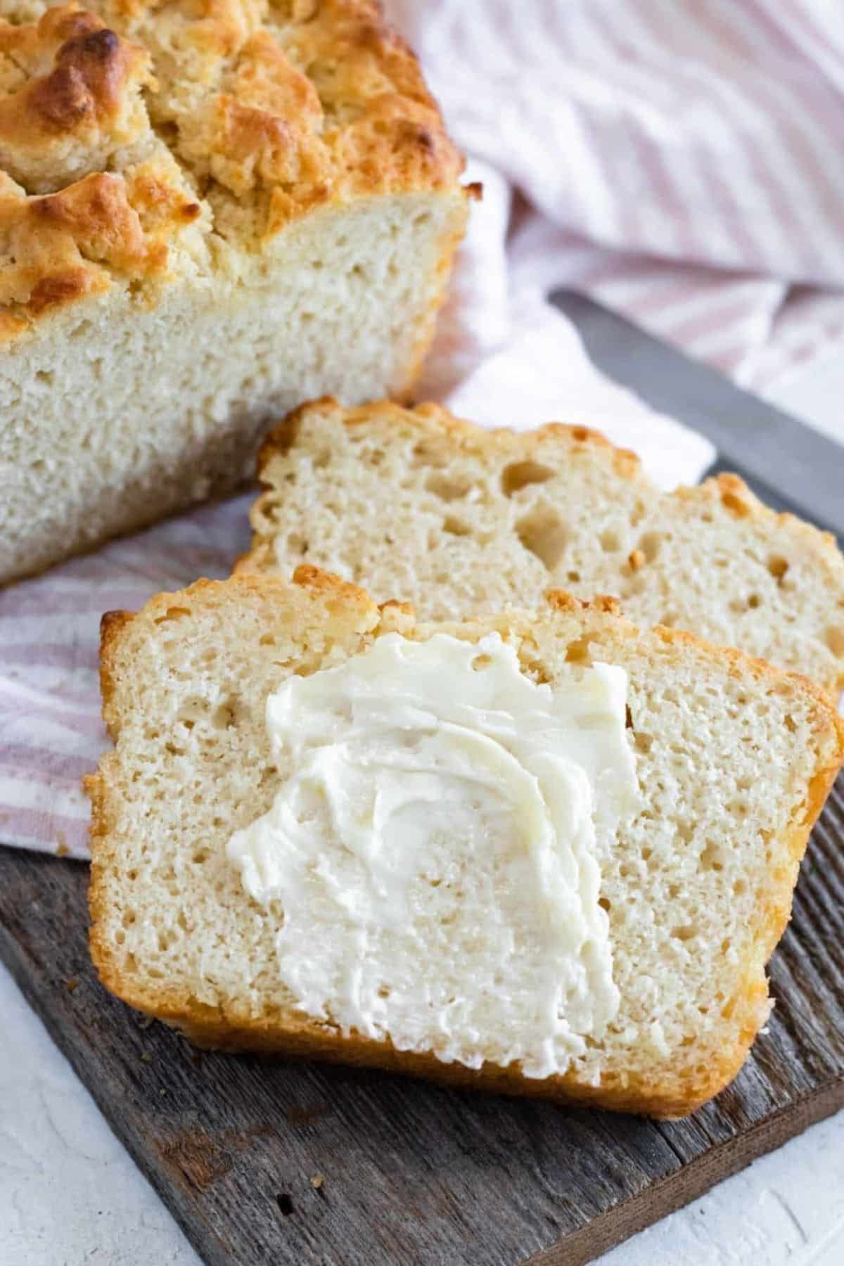 slices of beer bread with butter smeared 