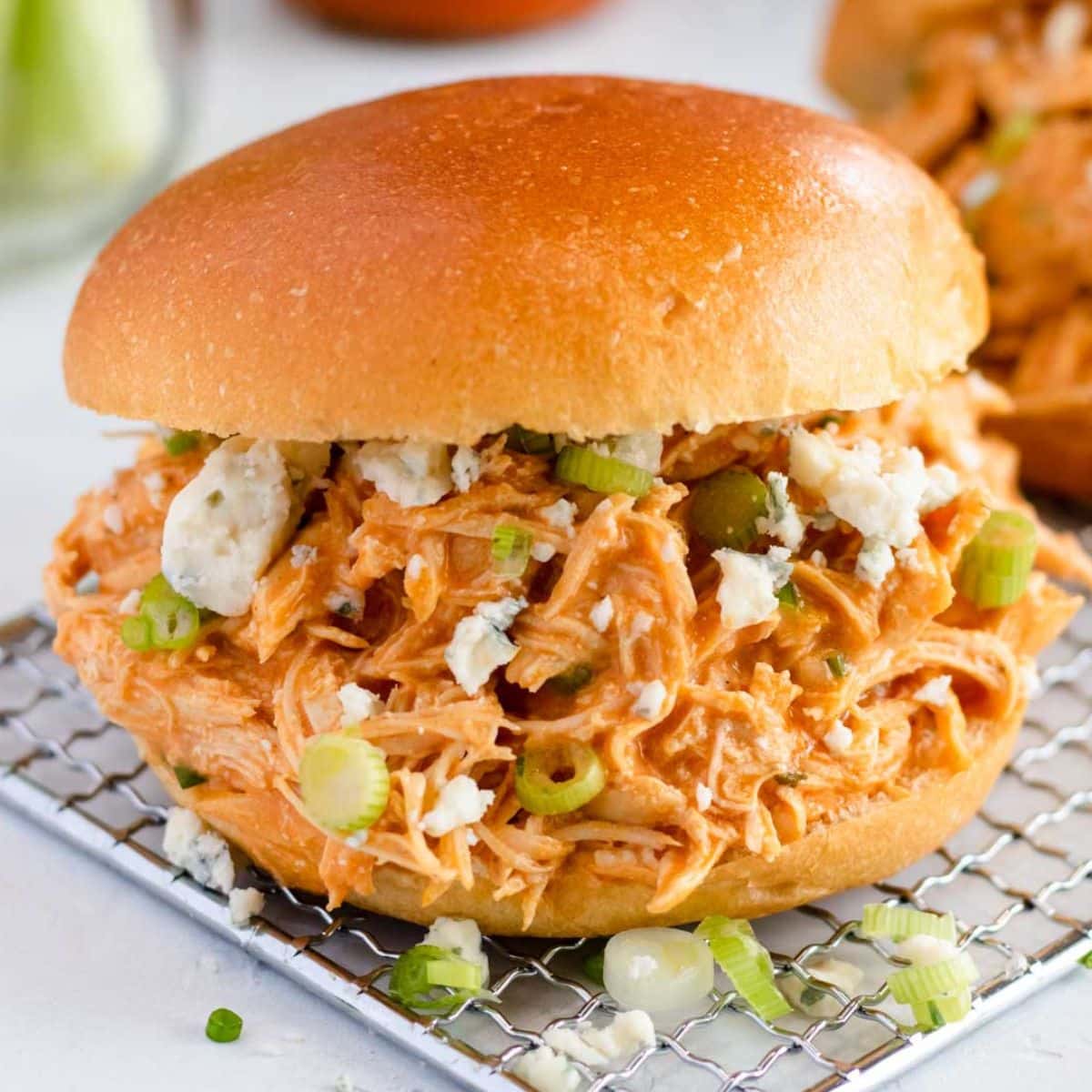 shredded buffalo chicken sandwich with extra blue cheese crumbles