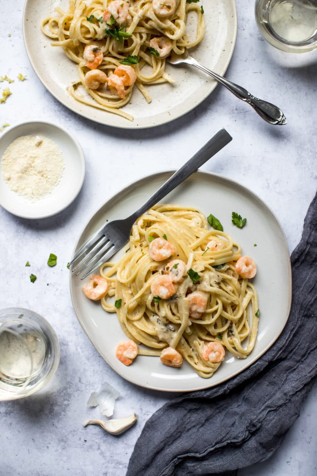 Shrimp Scampi Alfredo on a grey plate