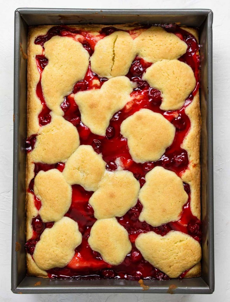 baked cherry pie bars in a 9x13 pan