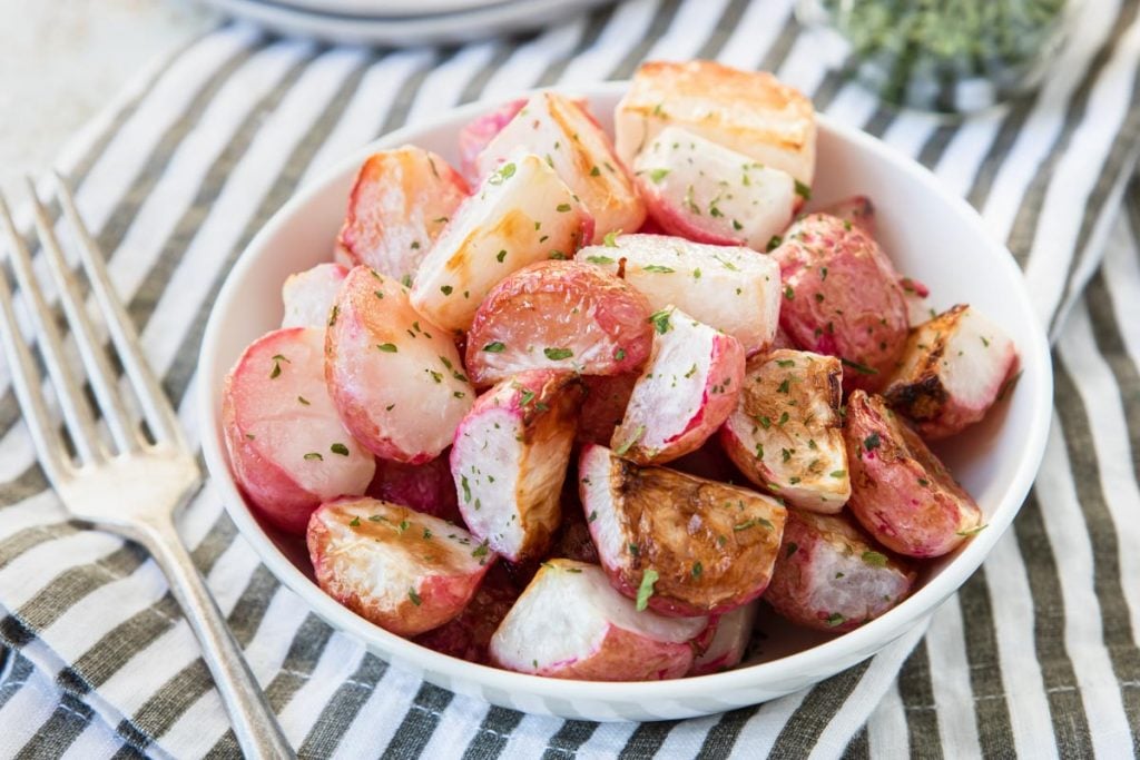 Roasted Radishes in a white bowl 