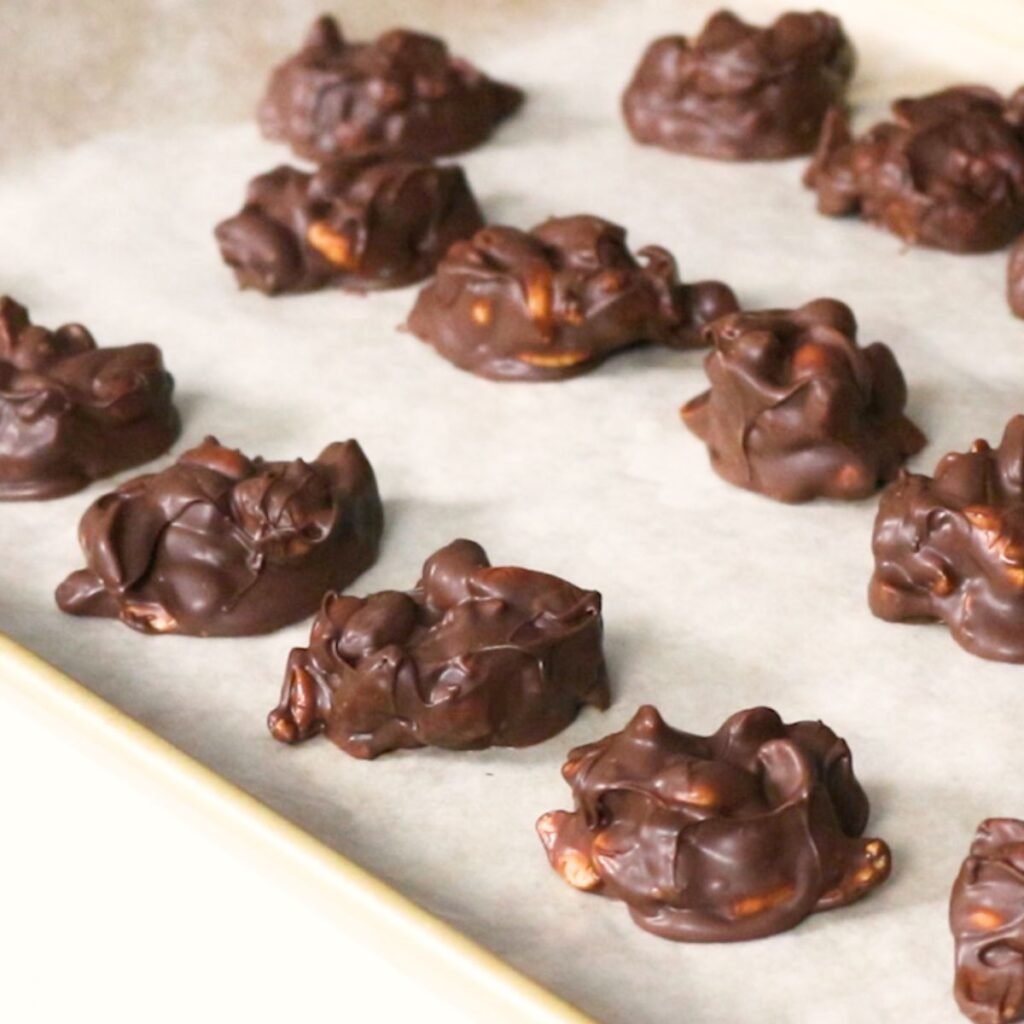 Peanut Clusters set up on wax paper 