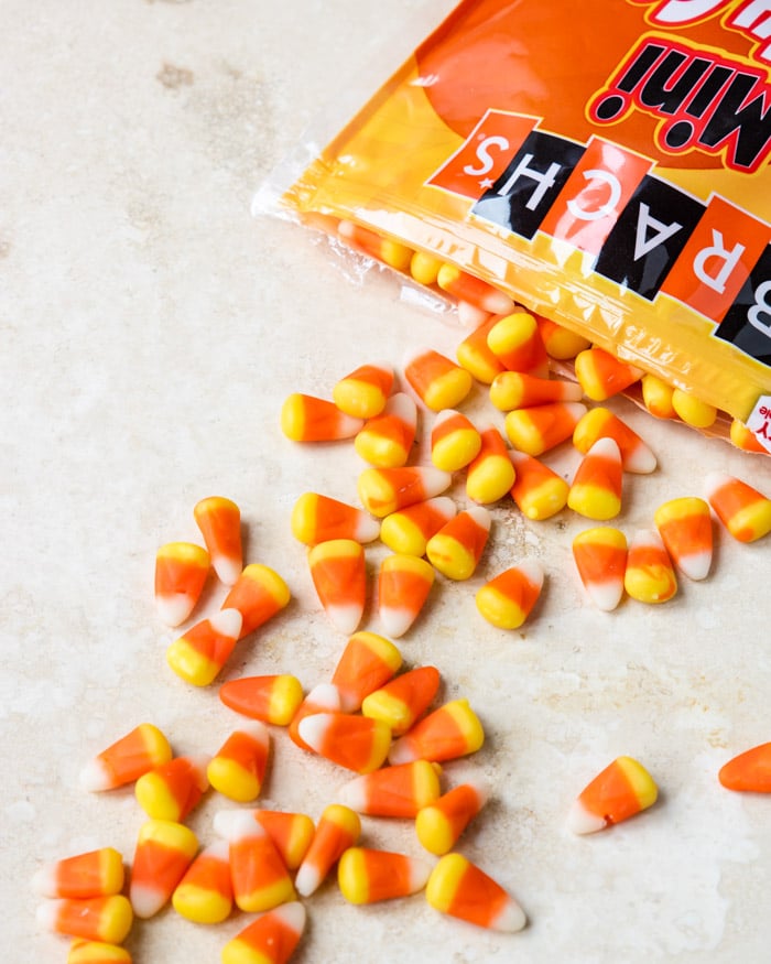 Candy corn spilling out of a bag