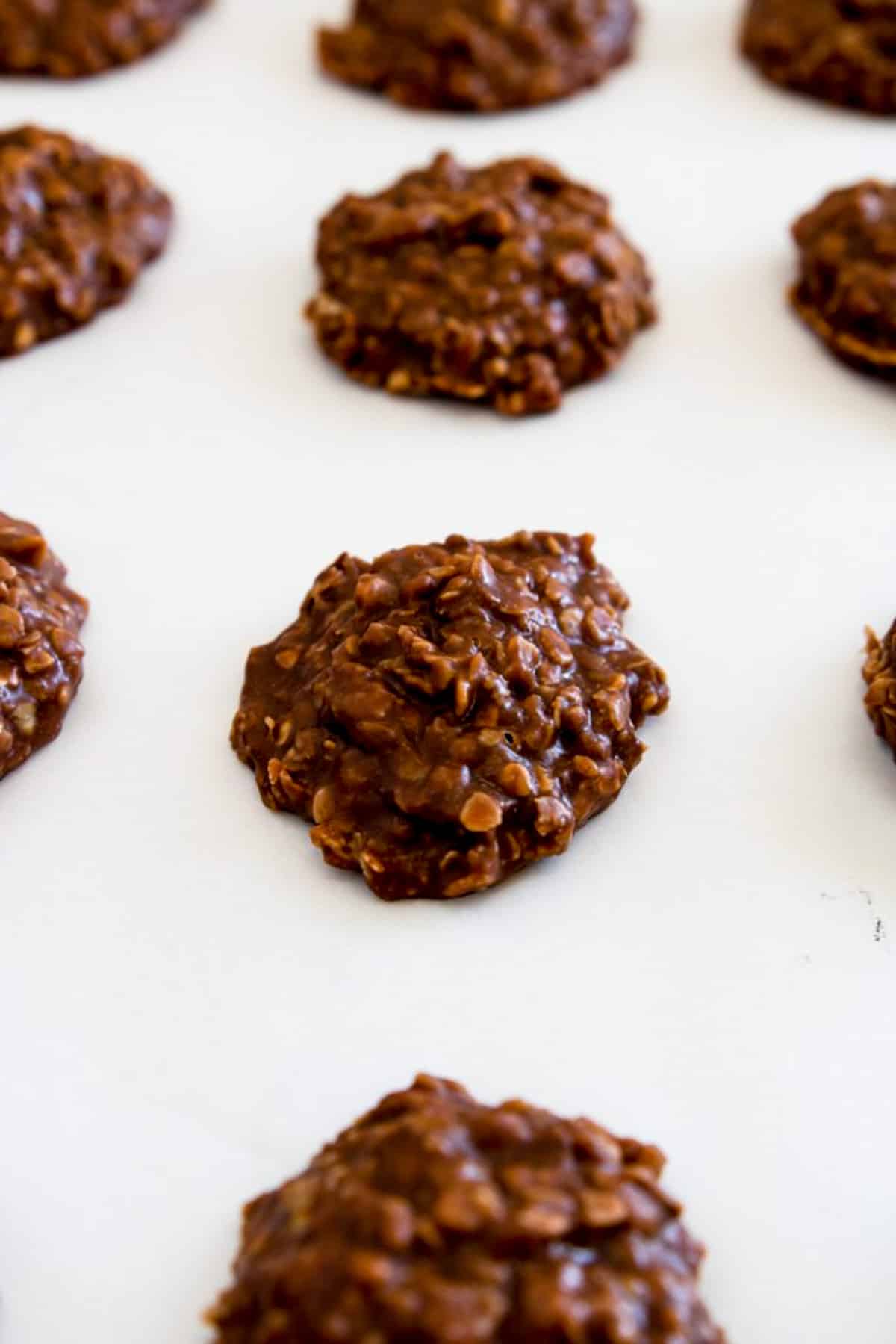 Chocolate No Bake Cookies on parchment paper