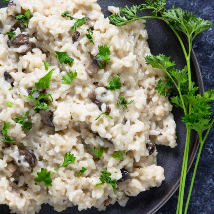 instant pot mushroom risotto garnished with parsley