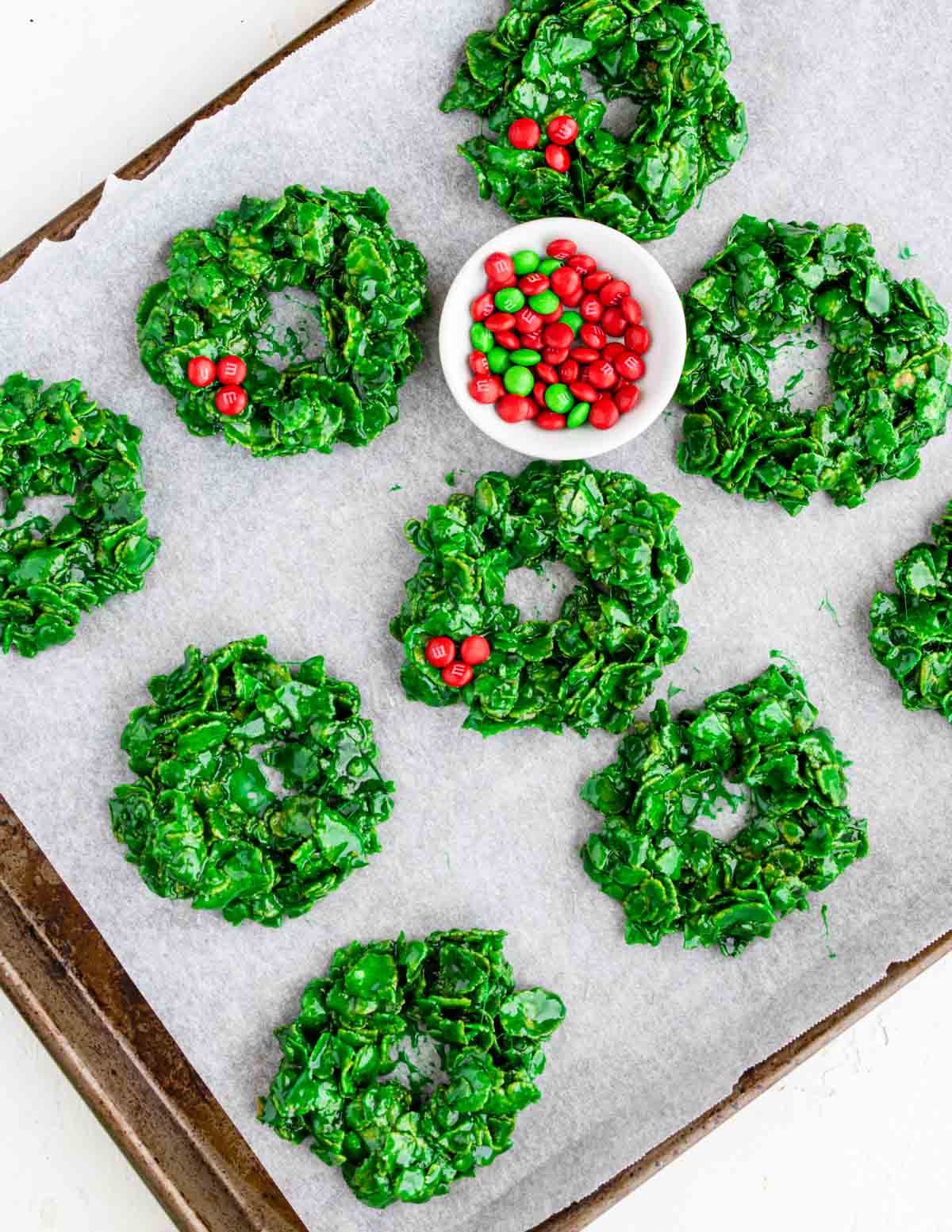 Christmas Cornflake Wreath Cookies on a piece of wax paper