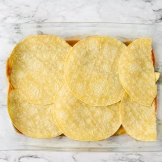 corn tortillas in a casserole dish
