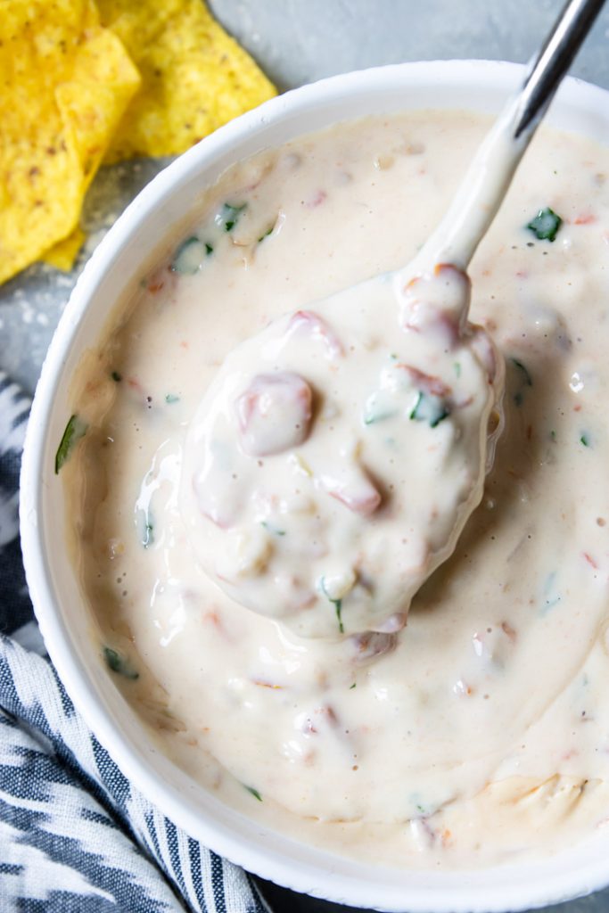 Queso dip on a spoon