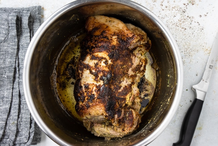 pork roast that has been browned in the instant pot