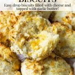 garlic cheddar biscuit opened to show the melted cheddar - pinterest text