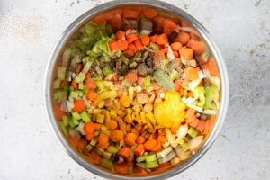 Step 2: chicken noodle soup seasonings placed on top of the chopped veggies