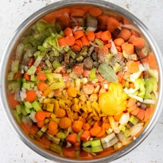 Step 2: chicken noodle soup seasonings placed on top of the chopped veggies
