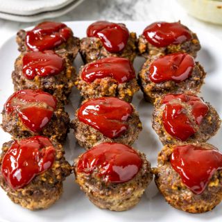 meatloaf cups on a white plate ready to be served