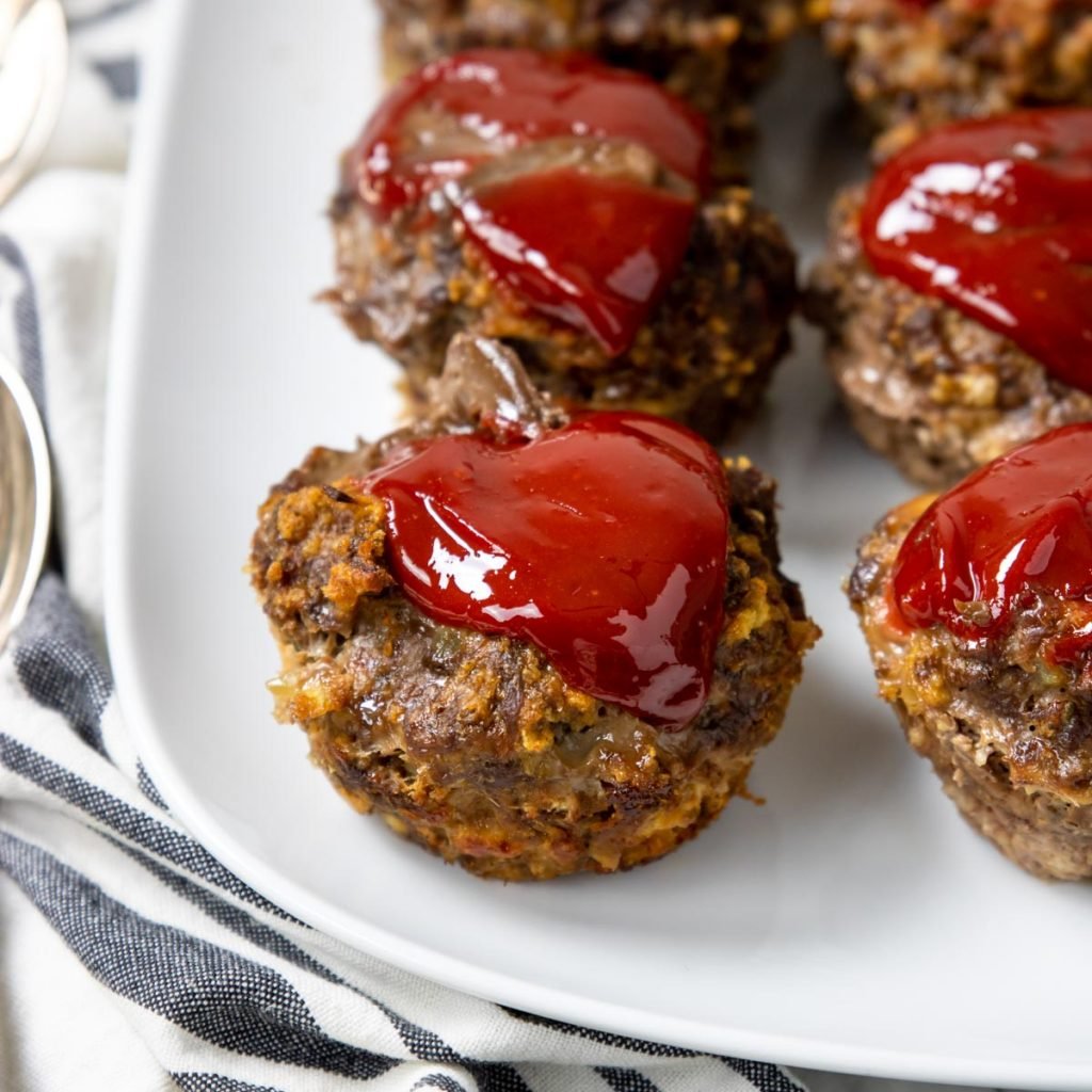 Meatloaf muffin topped with ketchup