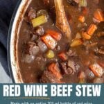 Red Wine Beef Stew in a pot with text overlay for Pinterest