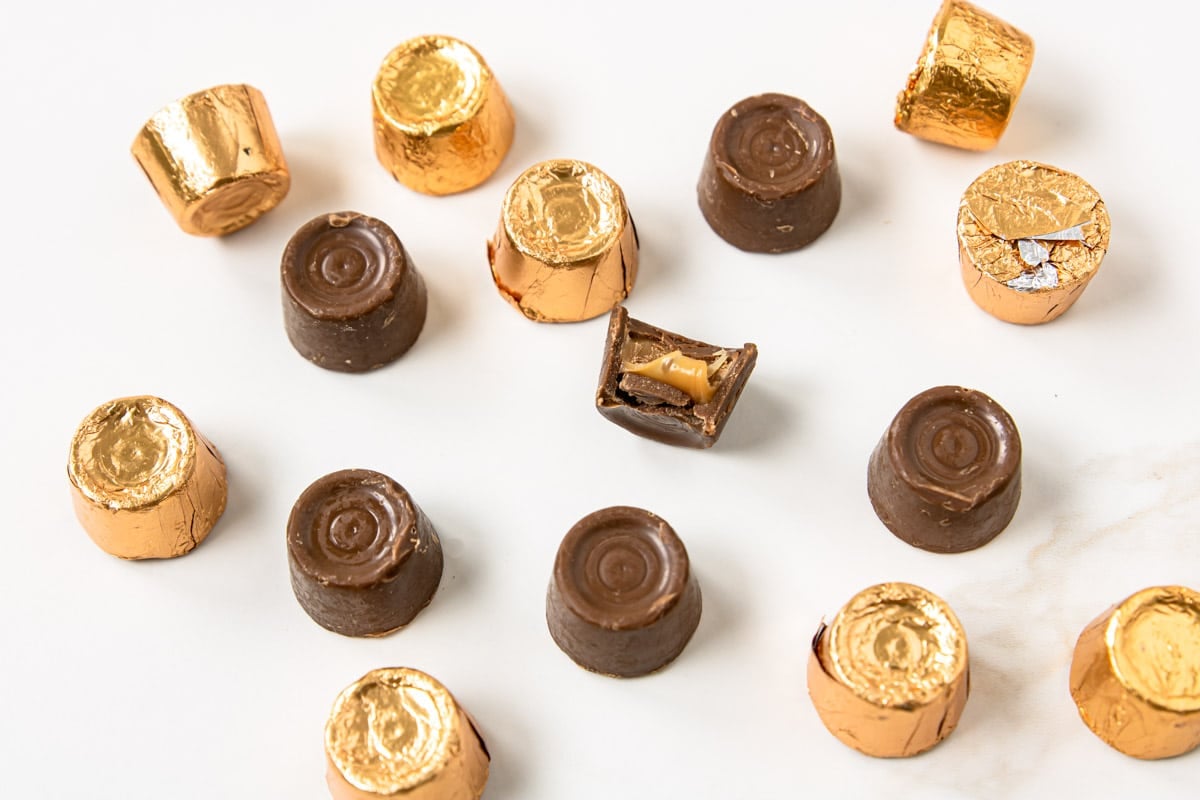 rolo candies, some unwrapped and some still in gold foil