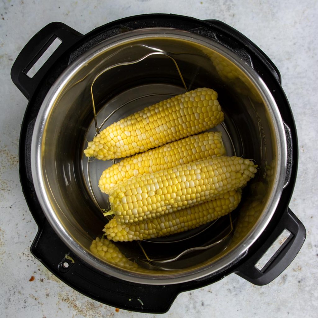 corn on the cob laying down in the instant pot