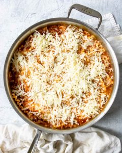 how to make skillet lasagna - step 3, topping the lasagna with shredded mozzarella