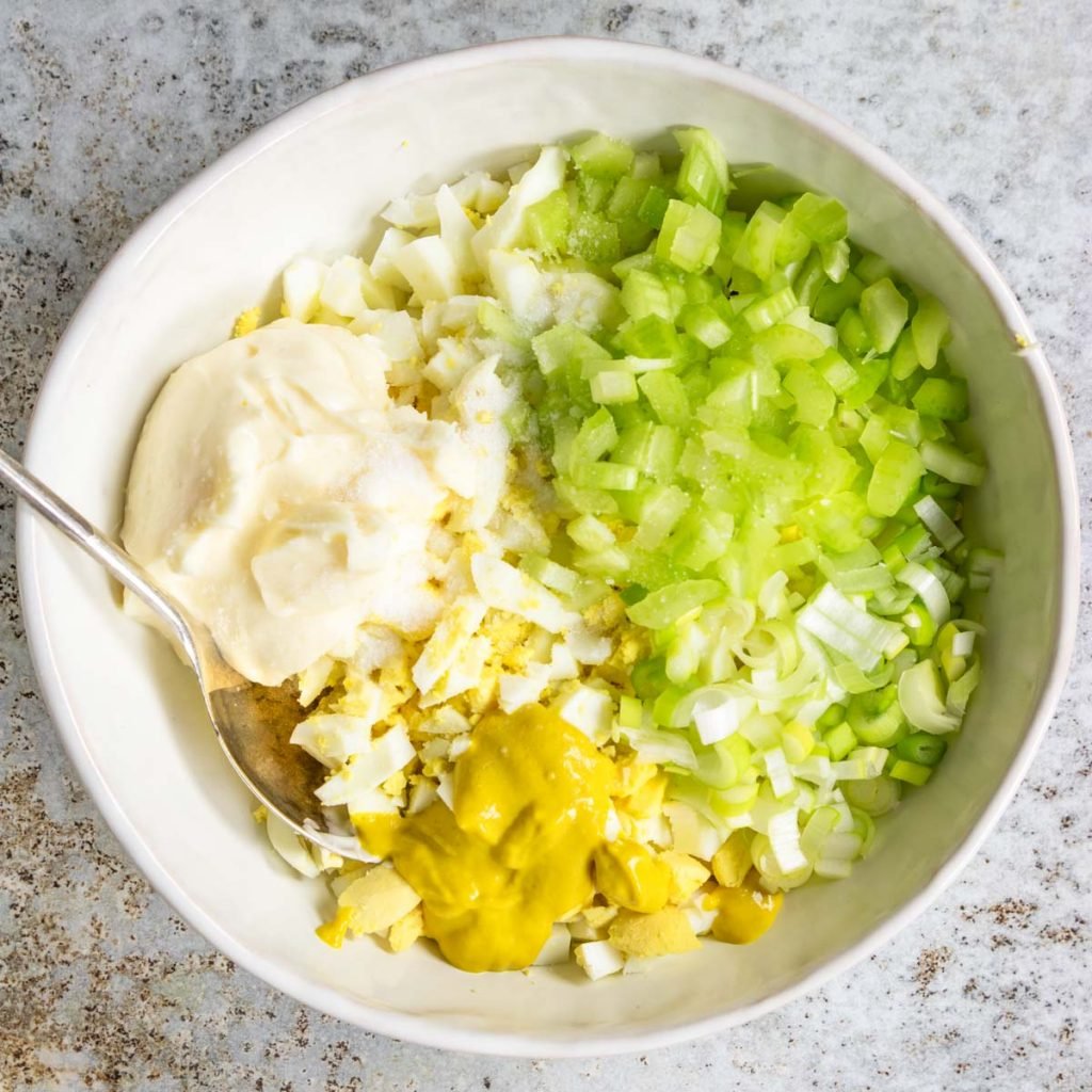 easy egg salad ingredients in a bowl