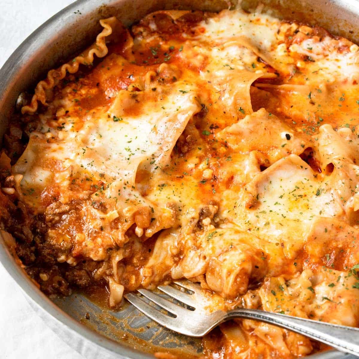 lasagna skillet with a fork