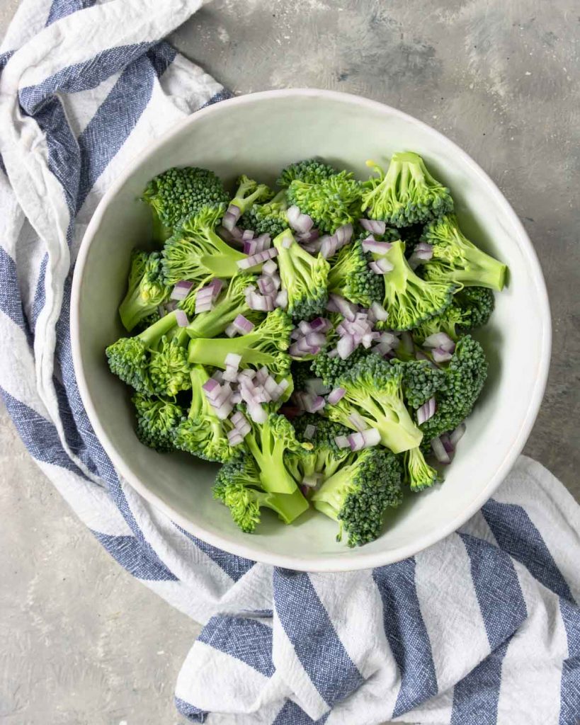 broccoli and onions in a bowl