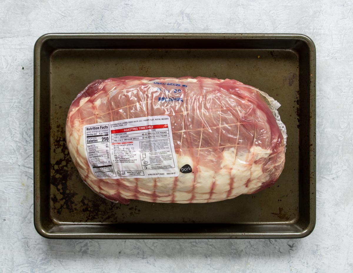 Fresh raw pork butt, also known as a pork shoulder or boston butt
