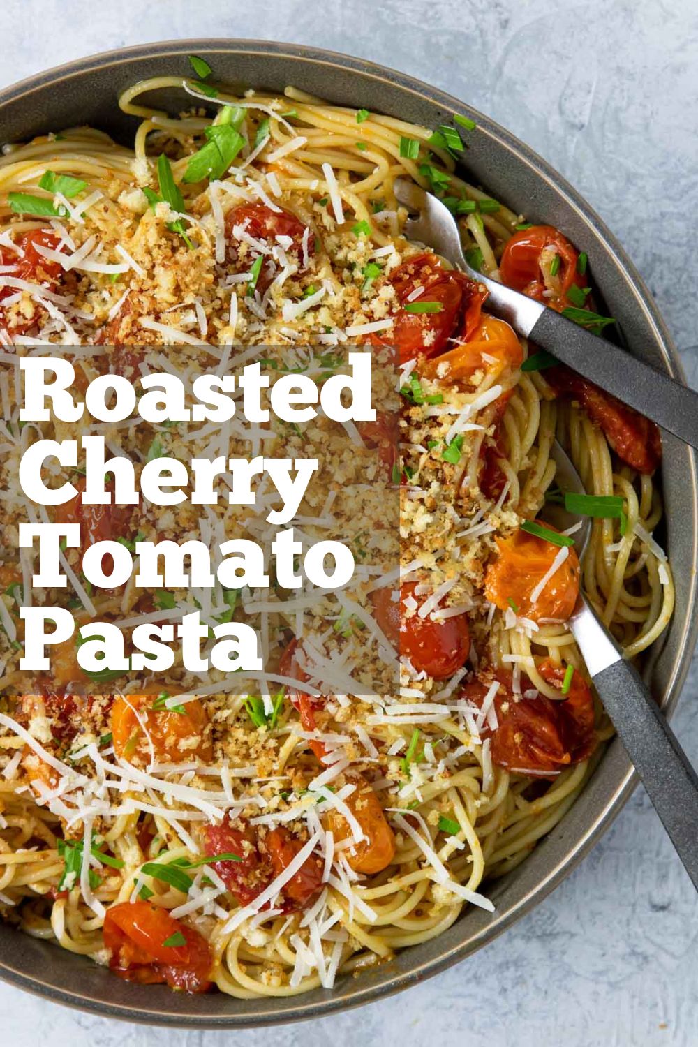 A dish full of pasta and roasted cherry tomato sauce with text overlay for Pinterest