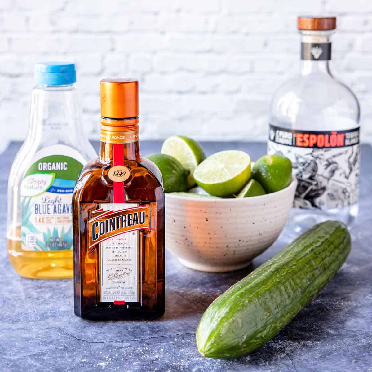 Ingredients for cucumber margaritas on a table